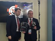 Maxim Oreshkin, Minister of Economic Development of Russia, presented the ROSINFRA award to Aleksei Zhirbin, General Director of Institute Stroyproekt.  